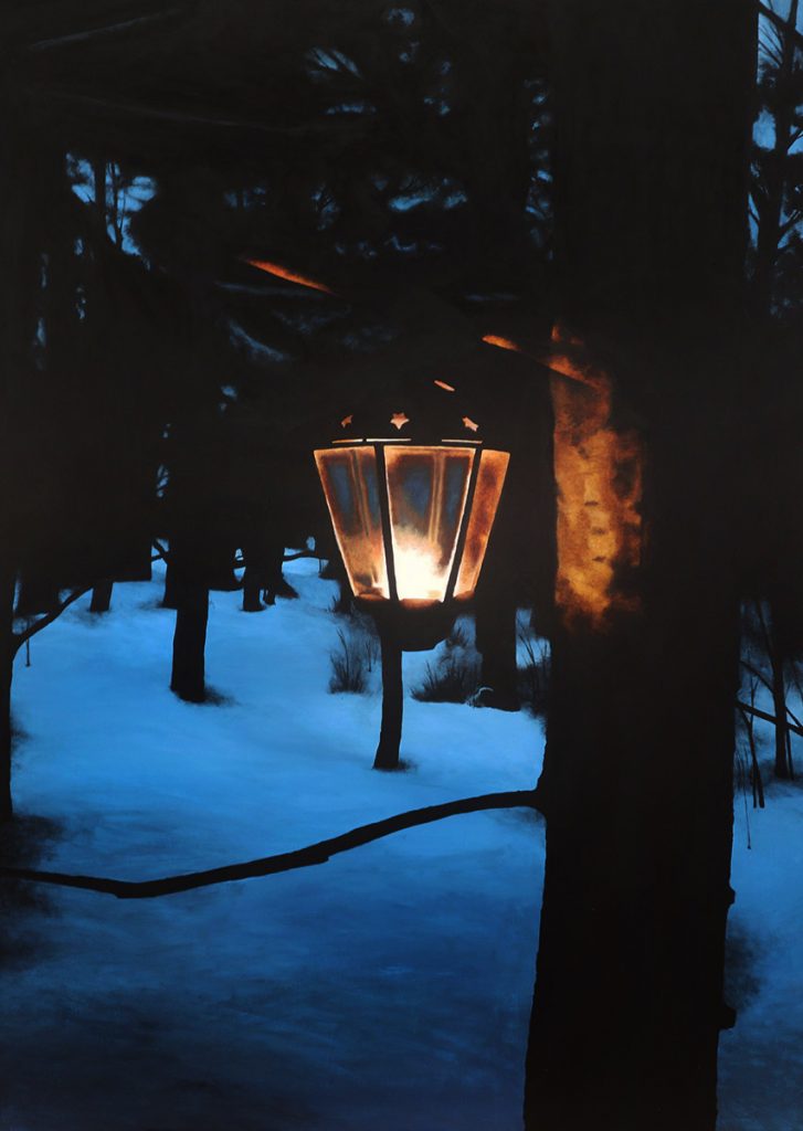 a candle lantern hanging on a tree in a snowy twilight landscape
